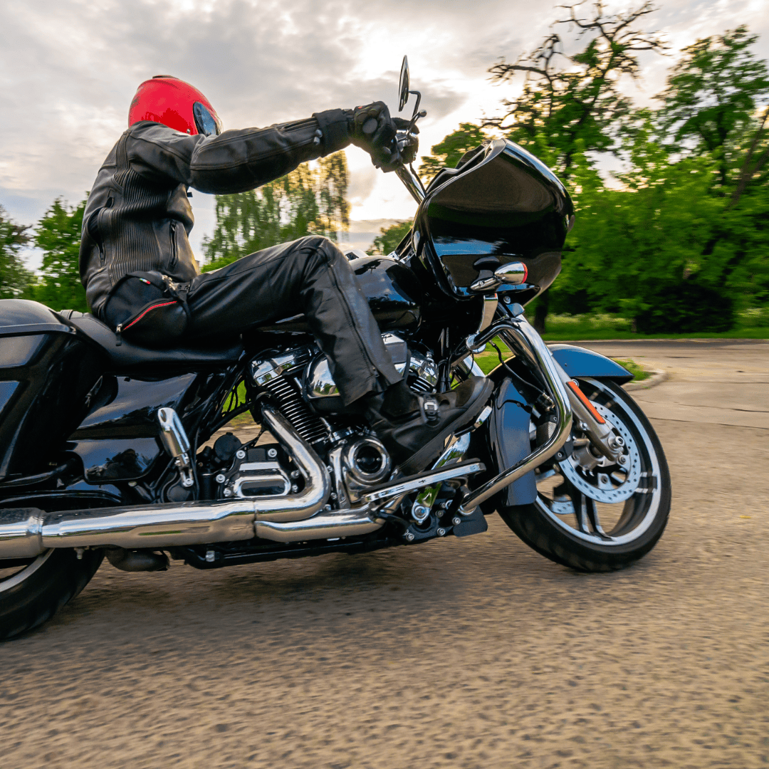 Touring motorcycle on an open coastal road